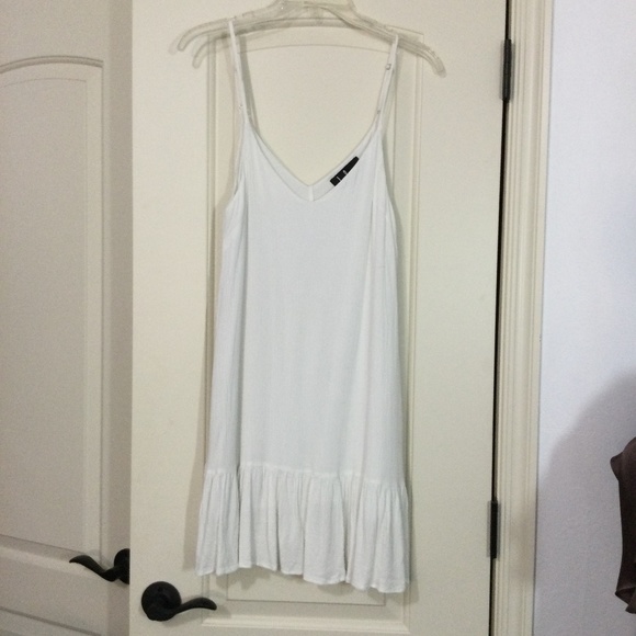 Lulu’s white sundress. - Picture 1 of 11